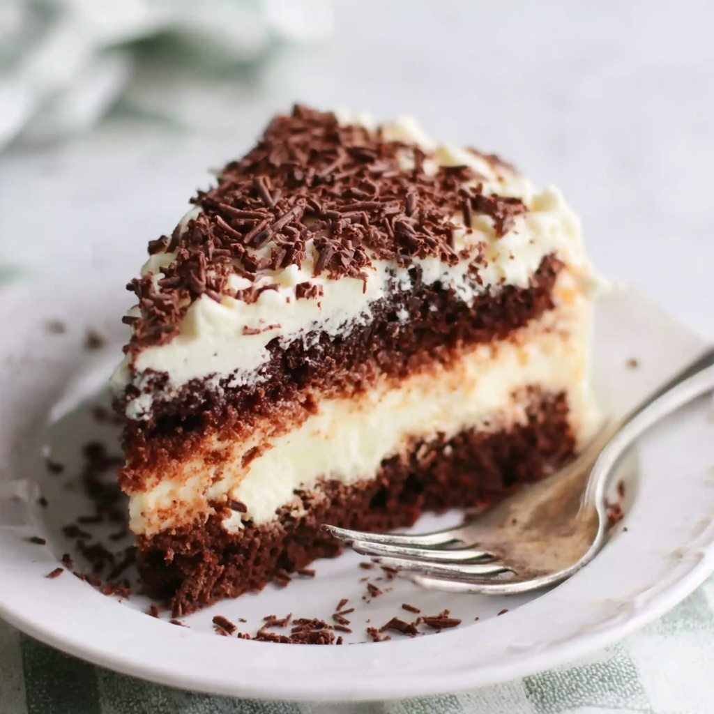 White German Chocolate Cake with a Cheesecake Center Recipe - Recipe Image