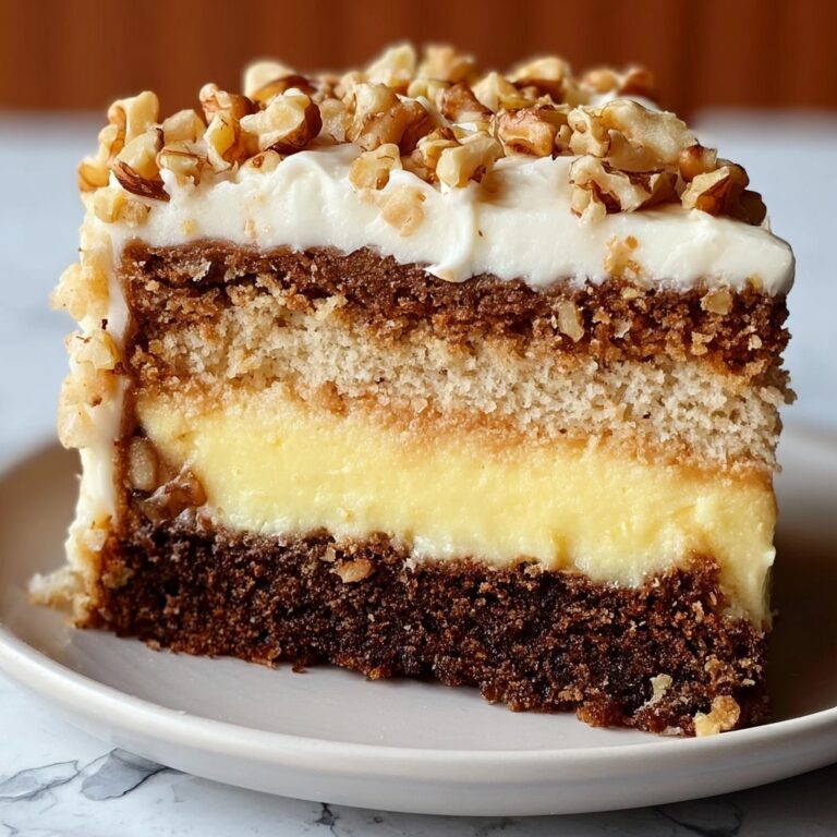 White German Chocolate Cake with Cheesecake Center and Coconut-Pecan Frosting Recipe