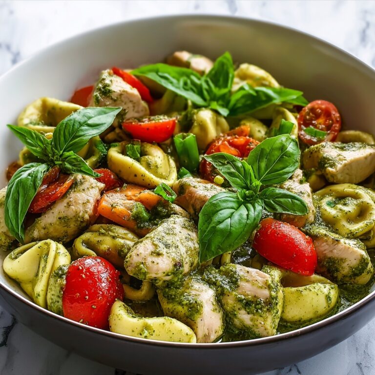 Quick Pesto Chicken Tortellini and Salmon in Creamy Tuscan Sauce Recipe