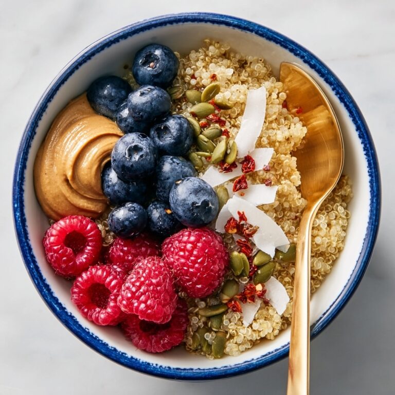 Mediterranean Quinoa Breakfast Bowl with Berries, Nuts, and Seeds Recipe