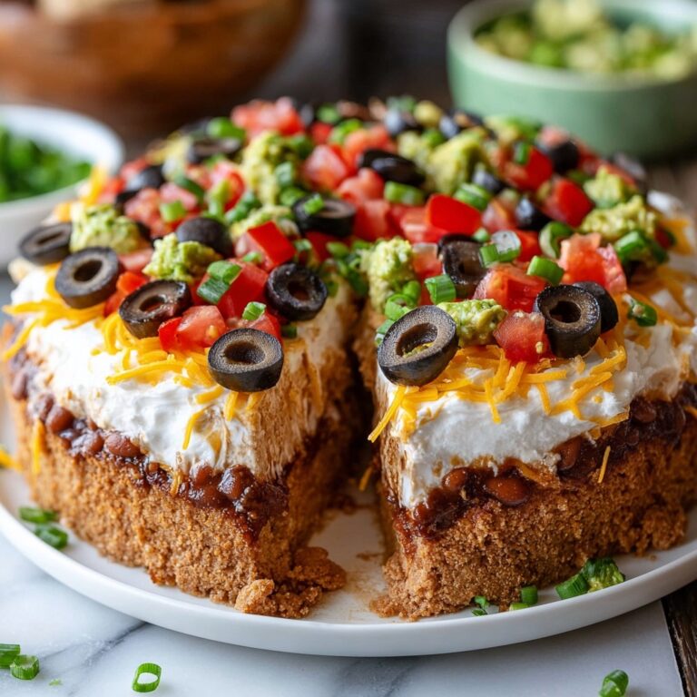 Seven-Layer Taco Dip: A Delicious Crowd-Pleaser Recipe! Recipe