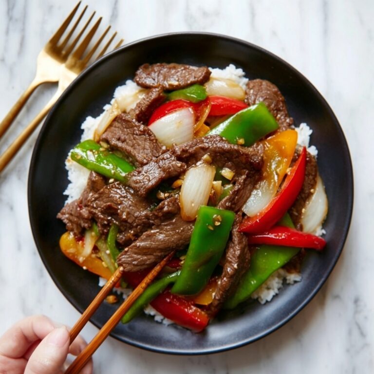 Pepper Steak Stir-Fry with Bell Peppers and Onion Recipe