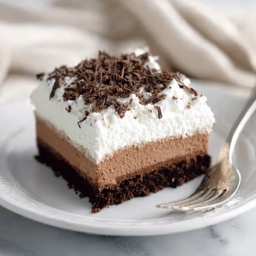 French Silk Brownies with Whipped Topping and Chocolate Shavings Recipe - Recipe Image